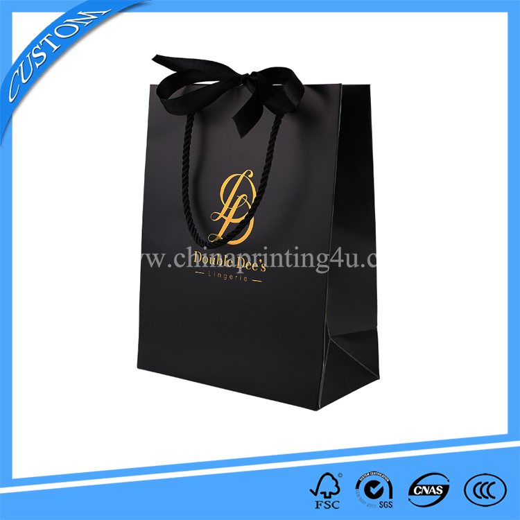 High quality rose gold foil logo cosmetic skin care packaging paper bag gold rope handle